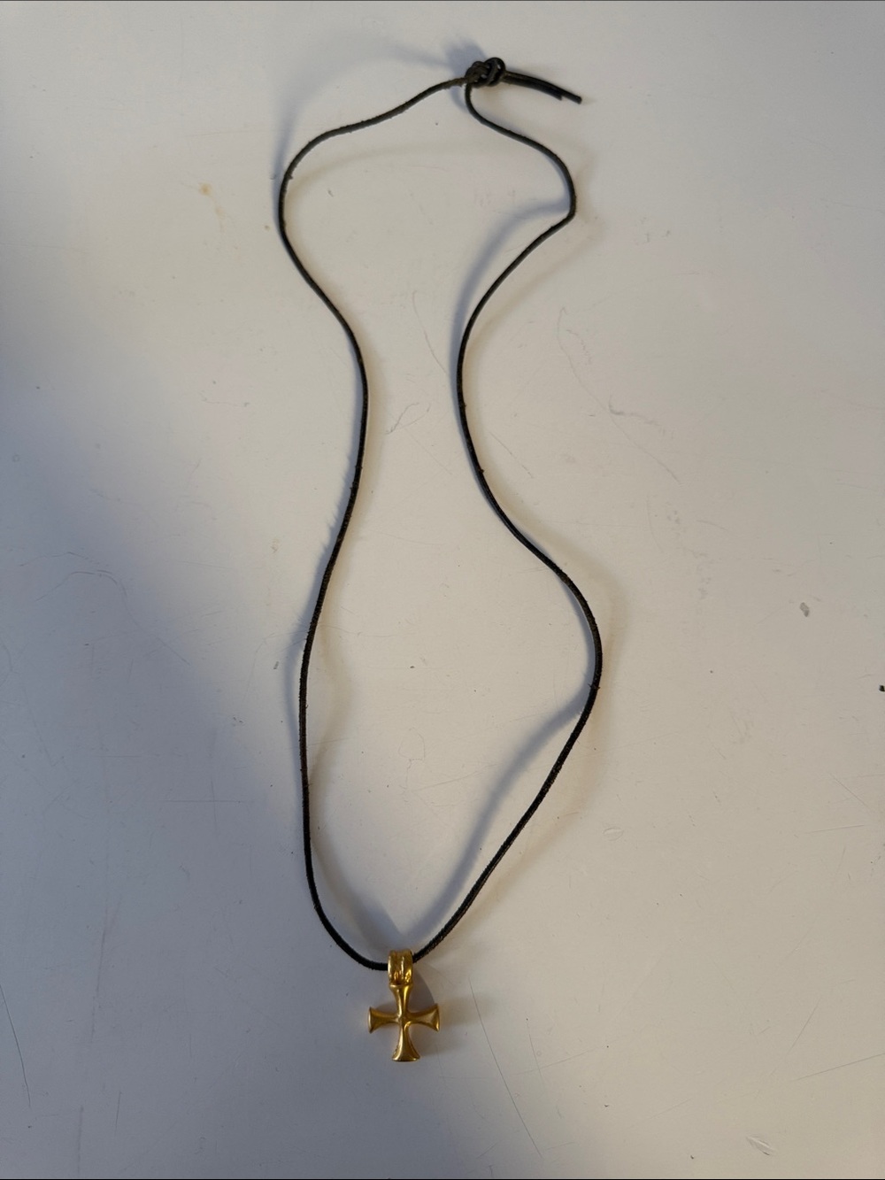 Gold Cross Pendant Necklace on Black Cord